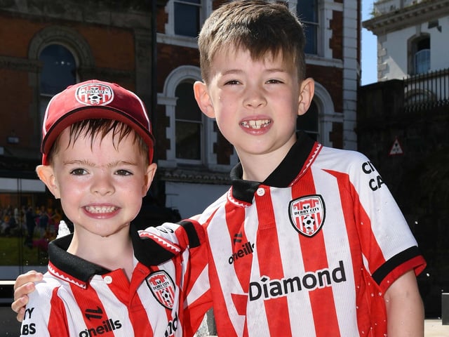 Pearse and Cillian Sparkes cooled down in the fountains at Guildhall Square.