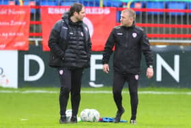 Derry City manager Ruaidhrí Higgins talks to his former assistant Alan Reynolds during the warm-up at Shelbourne, on Friday night. Picture by Kevin Moore/MCI