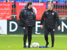 Derry City manager Ruaidhrí Higgins talks to his former assistant Alan Reynolds during the warm-up at Shelbourne, on Friday night. Picture by Kevin Moore/MCI