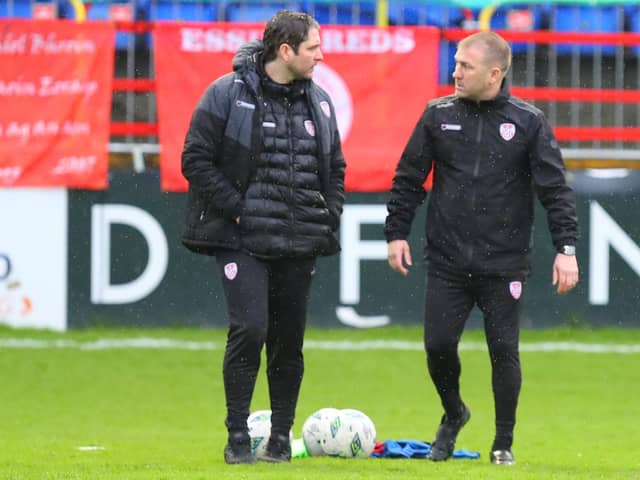 Derry City manager Ruaidhrí Higgins talks to his former assistant Alan Reynolds during the warm-up at Shelbourne, on Friday night. Picture by Kevin Moore/MCI
