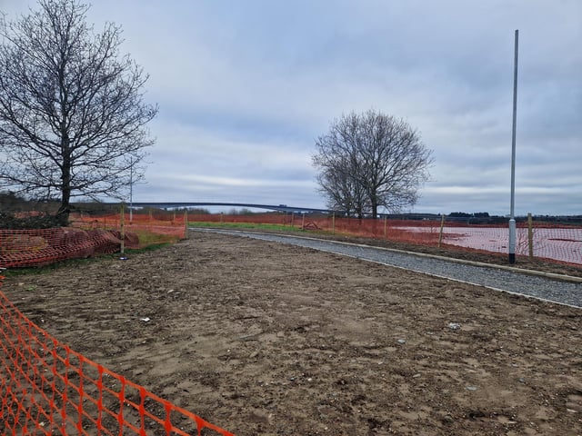 Works are steadily progressing on the new Derry bridge, which is due to be completed by Spring this year. The riverside path connecting the Bay Road Nature Reserve to the new bridge has kerbs and gravel laid and lampposts almost fully installed. The base for the bridge to sit on the Bay Road side seems to be fully complete with concrete being pored on the other side's base.