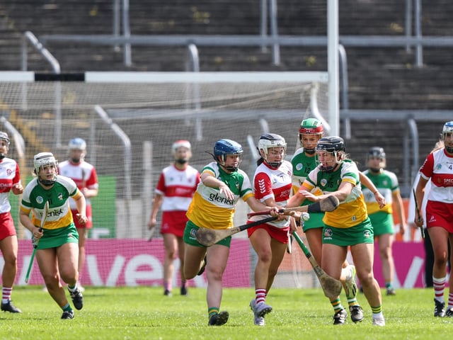 Derry's Rebecca Bradley with Mairead Teehan of Offaly battle during the Very Camogie League Division 2A Final in Thurles. (Photo: INPHO/Ben Brady)