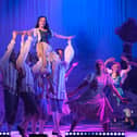Cinderella (Jasmine Gardiner) and members of the cast on stage at the Millennium Forum.