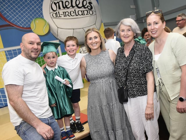 James enjoys the day with his family : Glendermott Graduation Day.