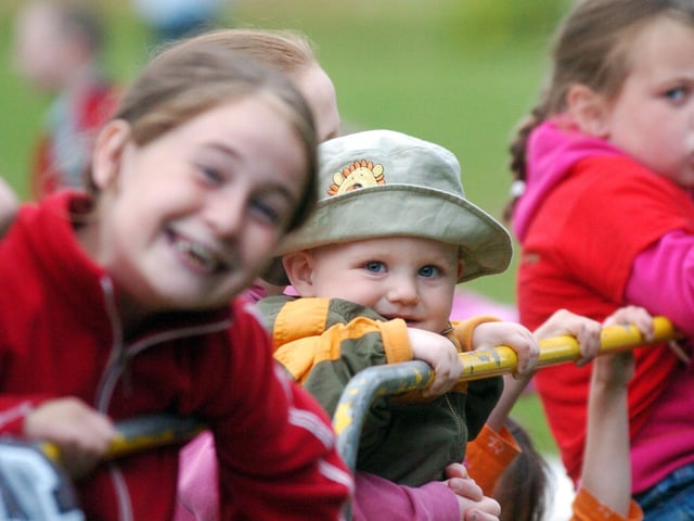Little Lee Gibson enjoys the live music at the Gasyard. (1608PG69) : Pictured  are families, festival goers and artists at the Gasyard Féile back in August 2005.