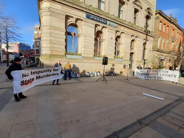 The portraits of the Bloody Sunday victims were lined up by behind banners protesting against the legacy bill.