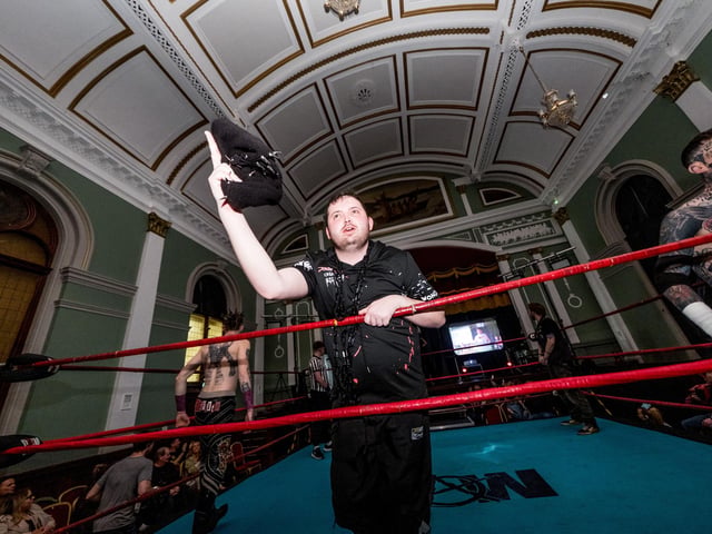 Enticing the crowd at the Brawl in the Hall.