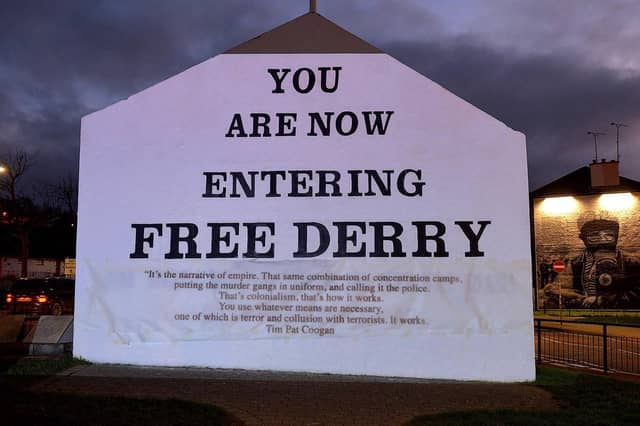 One of the projected images, on Free Derry Corner on Thursday evening, of the British colonial past from the 'The Sun Never Set And The Blood Never Dries' art project created by Art Everywhere. The event was part of Bloody Sunday 51 anniversary. Photo: George Sweeney. DER2305GS 118