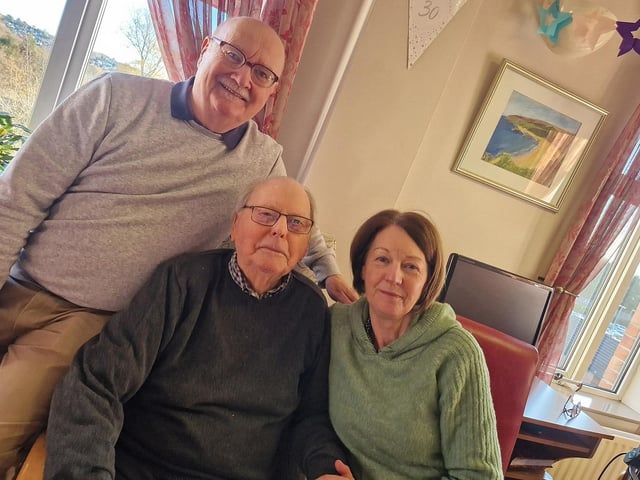 Conal McHugh (centre) pictured with his daughter Paula McGilloway and her husband John McGilloway.
