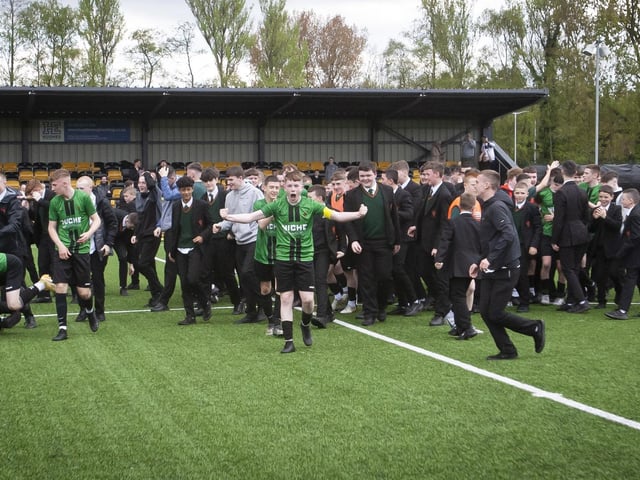 Captain Marvel (aka Shea McGinley) leads the celebrations.
