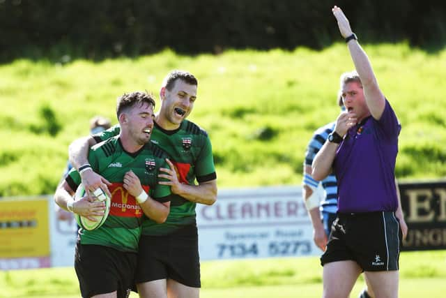 City of Derry scrum-half Jamie Millar celebrates his try against Ballymoney at Judges Road.