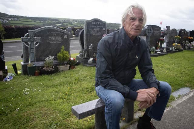 Paul Weller pictured at the graveside of Eamon Friel during his visit to the city on Wednesday afternoon. (Photos: Jim McCafferty Photography)