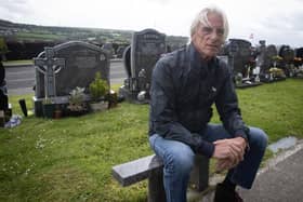 Paul Weller pictured at the graveside of Eamon Friel during his visit to the city on Wednesday afternoon. (Photos: Jim McCafferty Photography)