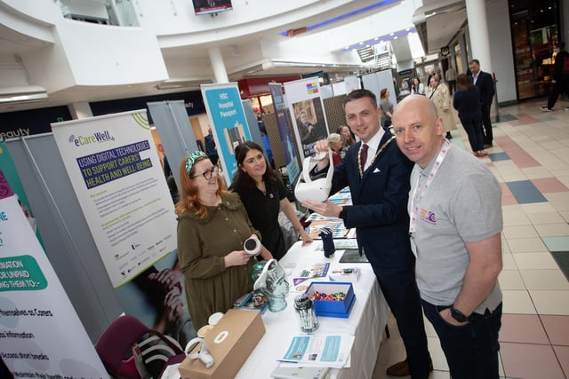 The Deputy Mayor Jason Barr and George McGowan, Project Director, Old Library Trust pictured at one of the 'One Stop Shops' on infomration on dementia during Thursday's event at Foyleside Shopping Centre. On left is eCareWell staff Tara Harkin and Katie McGuinness.