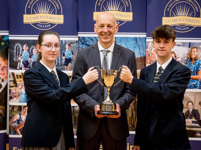 Senior Club of the Year (Athletics Club) received on behalf of the club by Katie Ferguson and Eoin Wilson. Also pictured Mr Chris Ryan (Co-ordinator of Extra-curricular Programme).