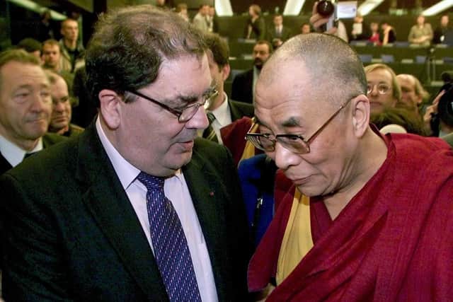 John Hume with the Dalia Lama at the European Parliament in Strasbourg in 2001. (Photo by FRANCK FIFE / AFP) (Photo by FRANCK FIFE/AFP via Getty Images)