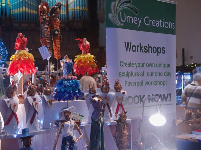 Gloria Perry's Urney Creations products on display.