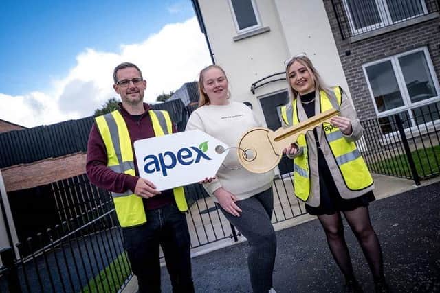 Kerry Maguire with Joe Doherty and Kelsey Boyle from Apex on handover day