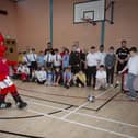 Fred The Red shows off some penalty taking techniques during Tuesday’s Induction Day.