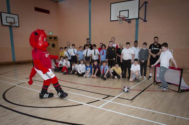 Fred The Red shows off some penalty taking techniques during Tuesday’s Induction Day.