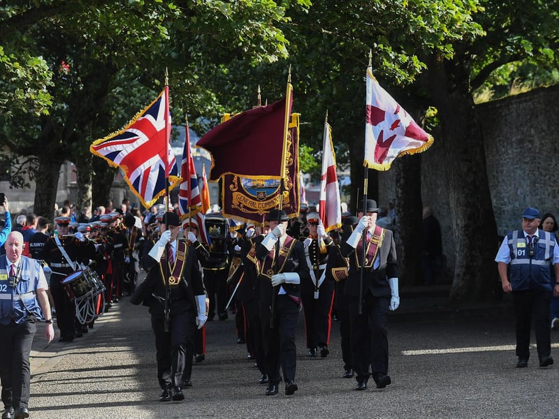 The General Committee of the ABOD lead a parade around Derry’s Walls. Photo: George Sweeney