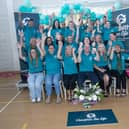 The new team at 'Health For Life' celebrating after Thursday's launch in Creggan.  : .