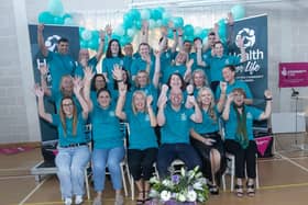 The new team at 'Health For Life' celebrating after Thursday's launch in Creggan.  : .