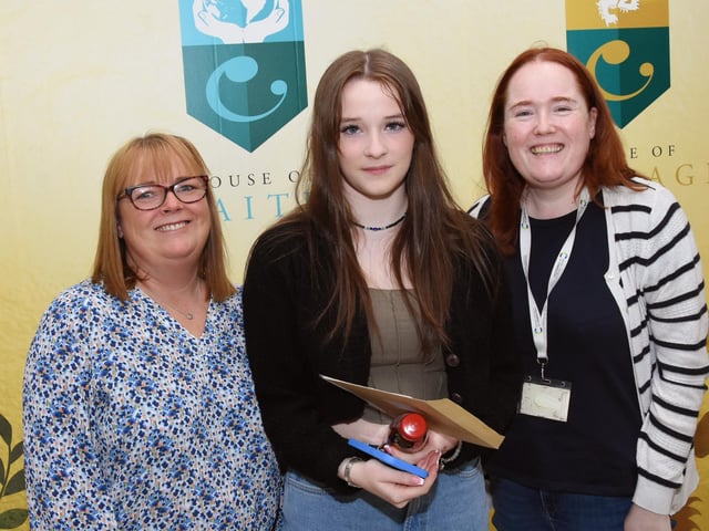Grace McCool collecting her GCSE results at St Cecilia's College, pictured with her mum Christine and teacher Miss McLarnon.