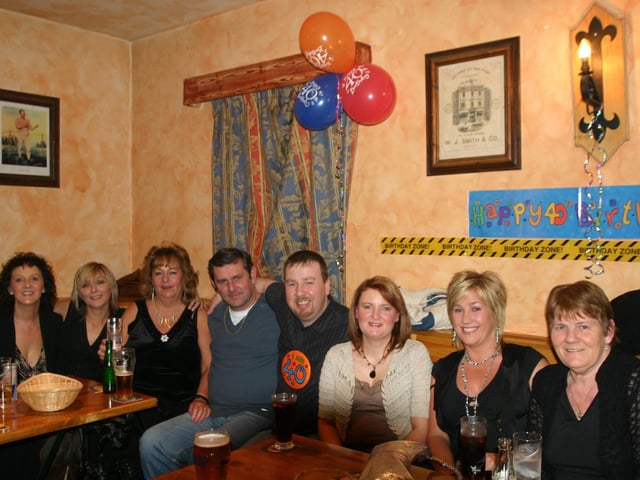 Friends and family having a good time at the surprise party in the Don Bar. 1197/dd : Parties in December 2005.