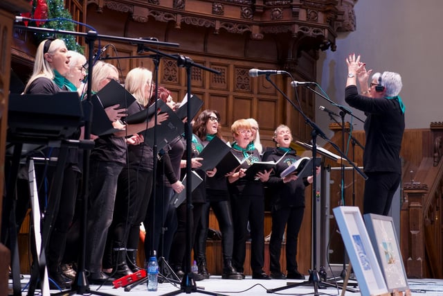 The Thyme to Sing choir performing in the Guildhall during the recent Christmas Craft Fair.