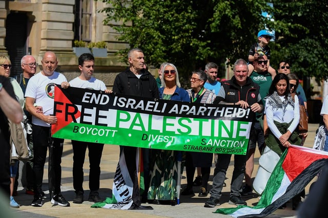People gather at a rally in Guildhall Square, organised by the Derry Branch of Ireland Palestine Solidarity Campaign to mark 300 days of Genocide in Gaza. Photo: George Sweeney