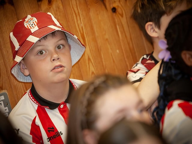 Young Charlie has a 'Hat-Attack' as he's captured on camera. (Photos: Jim McCafferty Photography)