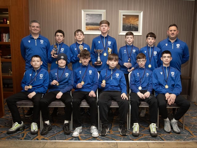 The Oxford 2013 squad pictured at the awards ceremony in the Maldron Hotel with coaches Coaches Ciaran McLaughlin and Jason Nicholas.