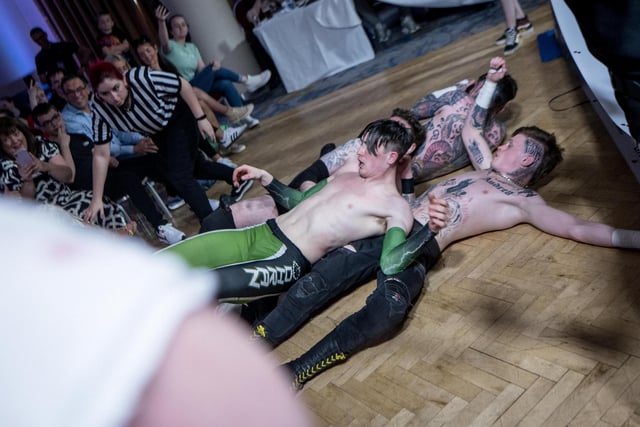 Carnage on the floor during this tag team match-up at the City Hotel. Photographs by Stephen Latimer.