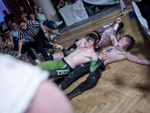 Carnage on the floor during this tag team match-up at the City Hotel. Photographs by Stephen Latimer.