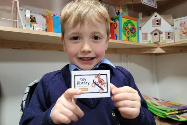 Six-years-old Darragh McCarthy became the first member of the Toy Library in the Zero Waste Hub.