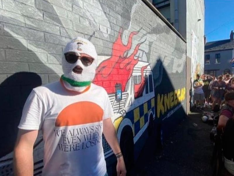 Kneecap is known for being a Belfast Irish rap group but one of them is a Derry man, the masked 'DJ Provai.' Kneecap played Glastonbury 2024 and are set to play 2025.