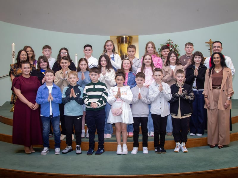 Mrs. McKane's Y7EK class from Sacred Heart PS, who received the Sacrament of Confirmation from Fr. Patrick Lagan at the Church of the Immaculate Conception, Trench Road, Waterside last Thursday.. Included in photo is Mrs. Elaine Sweeney, Miss Jessica Curley and Mrs. Seana Duddy, Classroom Assistants. (Photo: Jim McCafferty Photography)