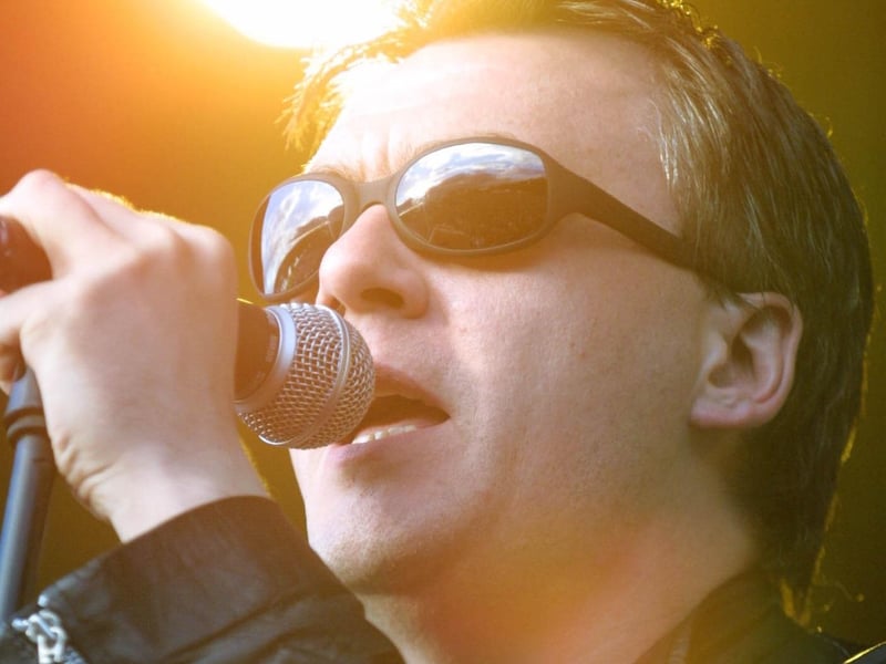 Paul McLoone gets the crowd going as the Undertones perform at the Bryan Adams concert.(2808JB16)
