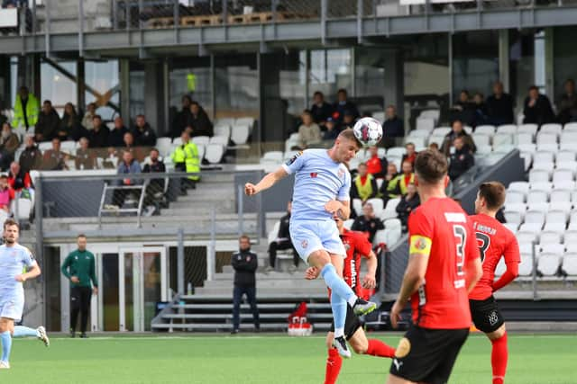 Derry City's Ronan Boyce wins this header against HB Torshavn in the first leg of the Europa Conference League at the Tórsvøllur Stadium, Torshavn, Faroe Islands. Photographs by Kevin Moore.