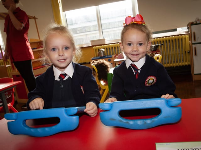 Kayleigh and Reeva hard at work on their I-Pads at Holy Child PS.