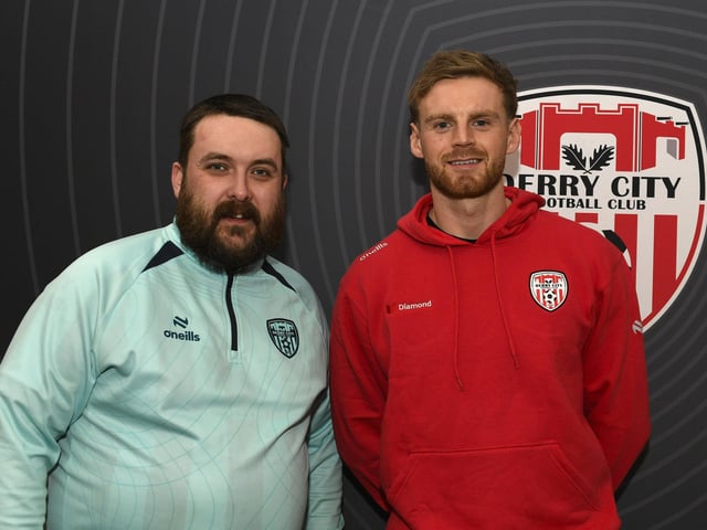 Candystripe fan John Carrigan pictured with Derry City's Rob Slevin at the club's merchandise outlet in Foyleside Shopping Centre. Photo: George Sweeney