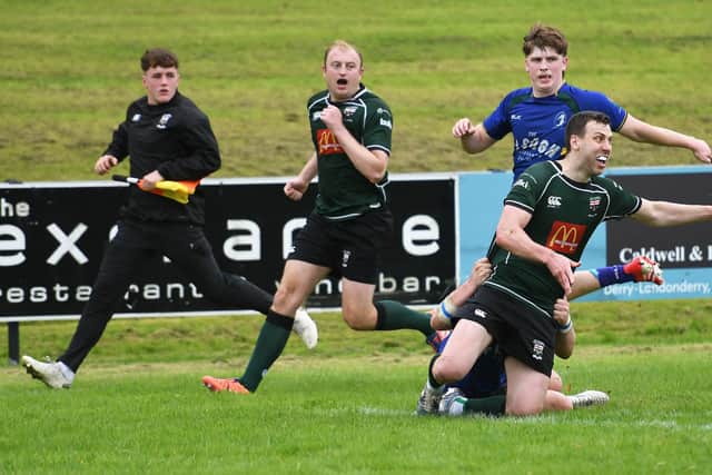 Ian Bratton gets the ball away to set up the second try against Lisburn last week. (Photo: Keith Moore)