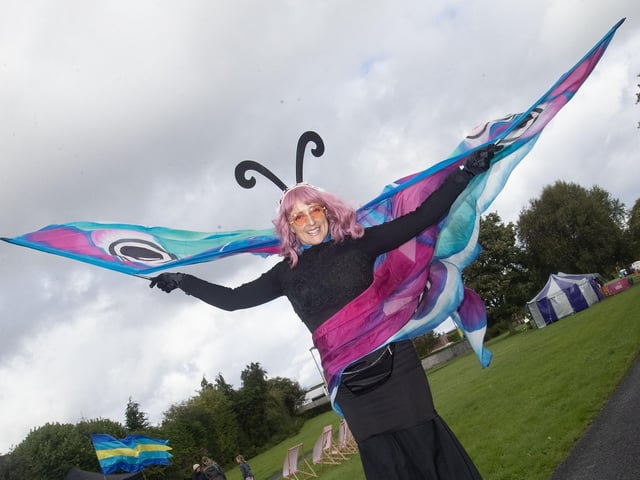 One of the many colourful characters at Saturday's event in Woodburn Urban Park. : .