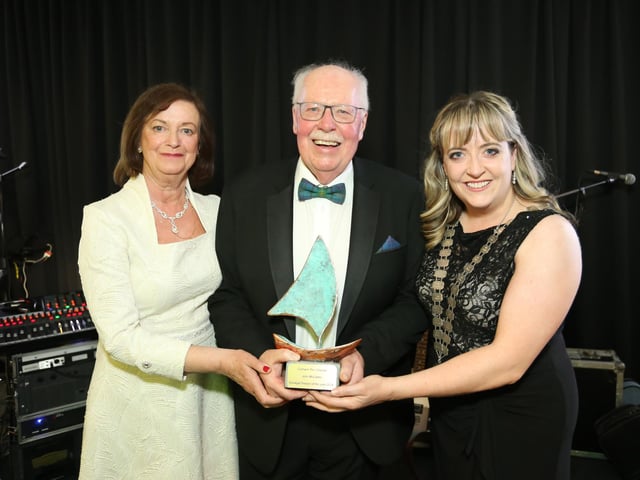 President of the Donegal Association Elaine Caffrey with John and Breda McCarter.