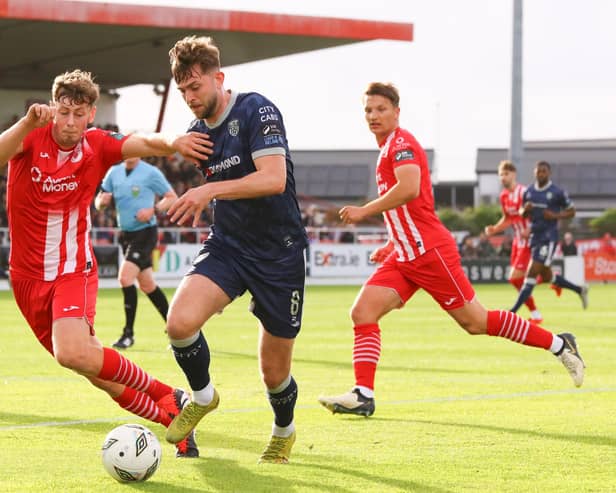 Will Patching gets on the ball against Sligo Rovers at the Showgrounds.