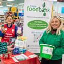 DECEMBER: Mayor Sandra Duffy at the launch of the Tesco Food Drive in Quayside with Karen Mullan, Foyle Foodbank and Fionnuala O’Reilly, Tesco Community Champion. Picture Martin McKeown. 01.12.22