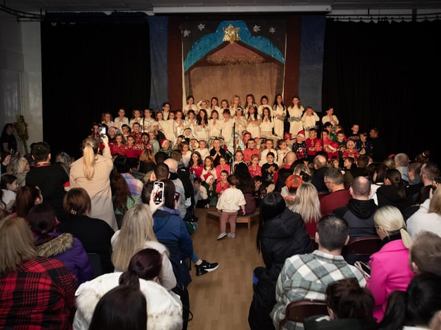 Proud parents look on as their children perform in the Annual Steelstown PS Nativity.