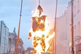An effigy of Robert Lundy in flames in Derry city centre last December.