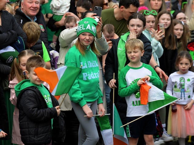 Watching the St Patrick’s Day parade. Photo: George Sweeney.